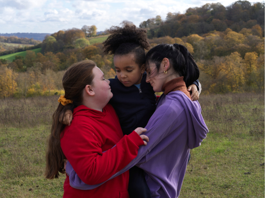 A film still from 'Lollipop' featuring Molly and her two children